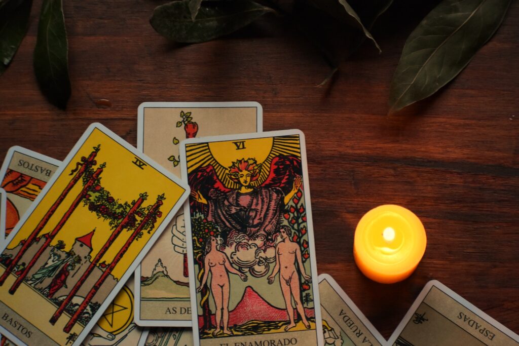 Tarots Cards and Candle on Table